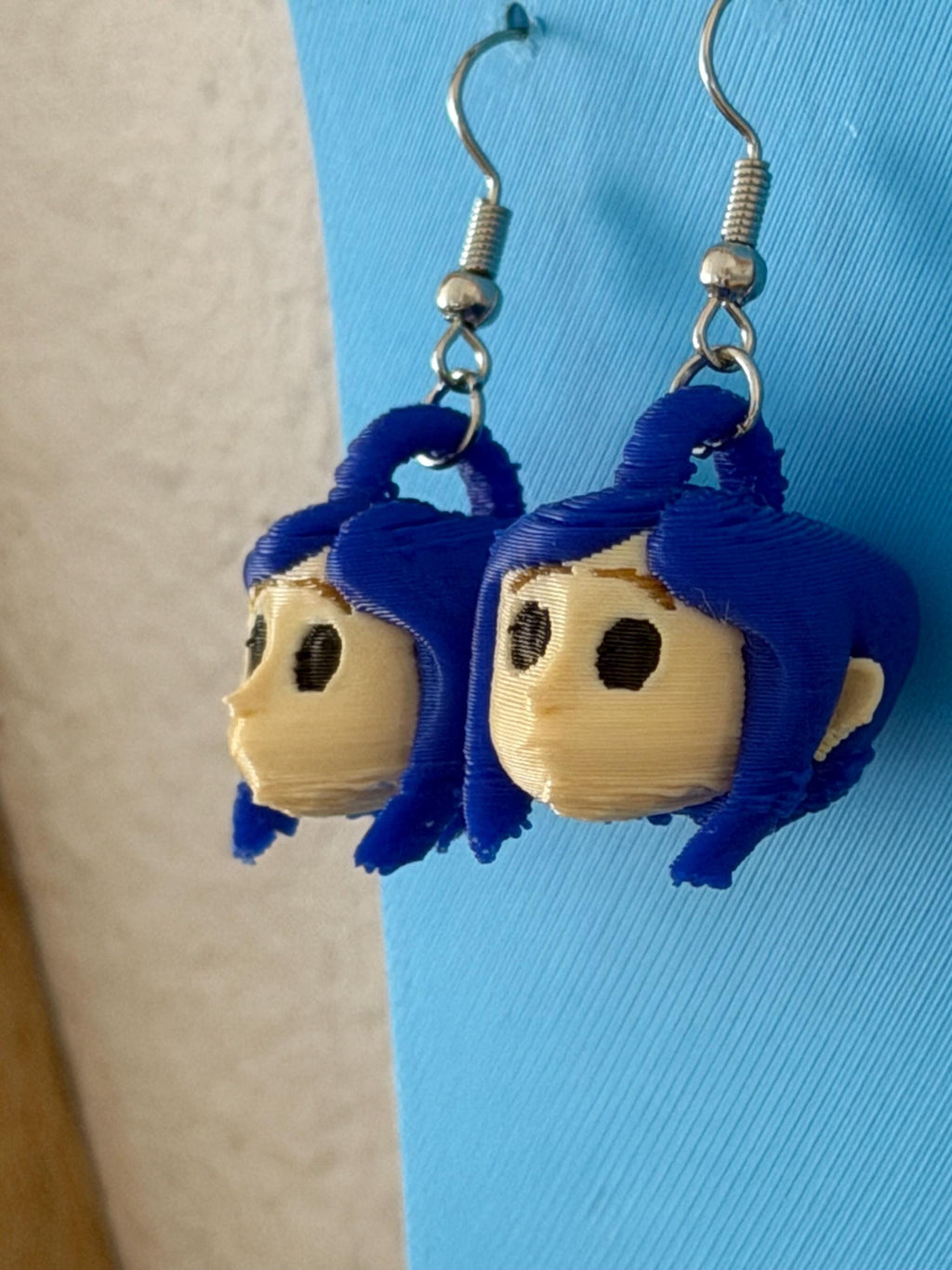 Aretes Niña de Ojos de Botón